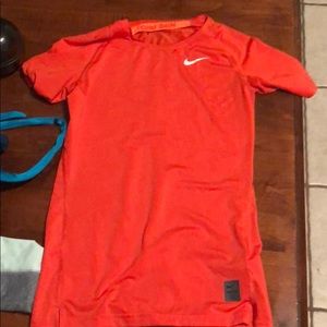 Orange Nike pro shirt